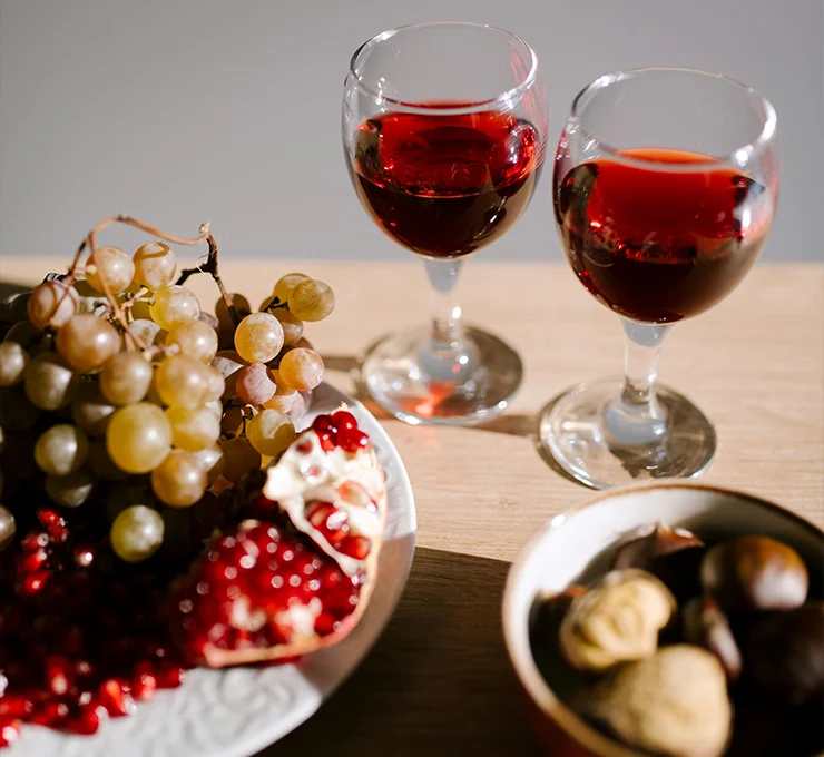 A table with food and sweet wine glasses