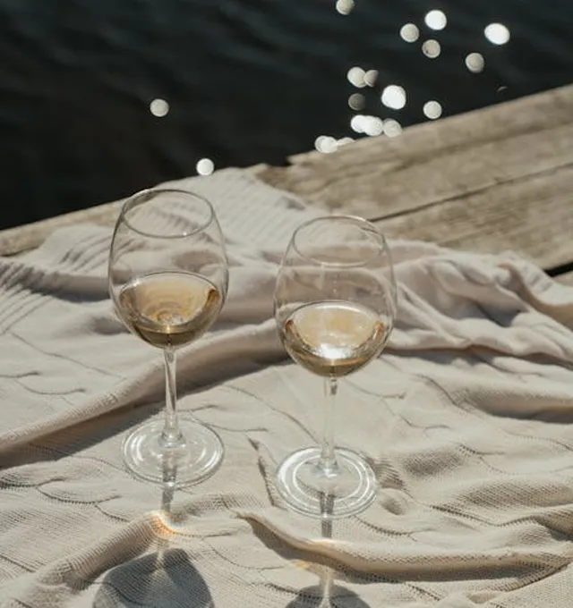Two glasses of Zalema white wine by the sea